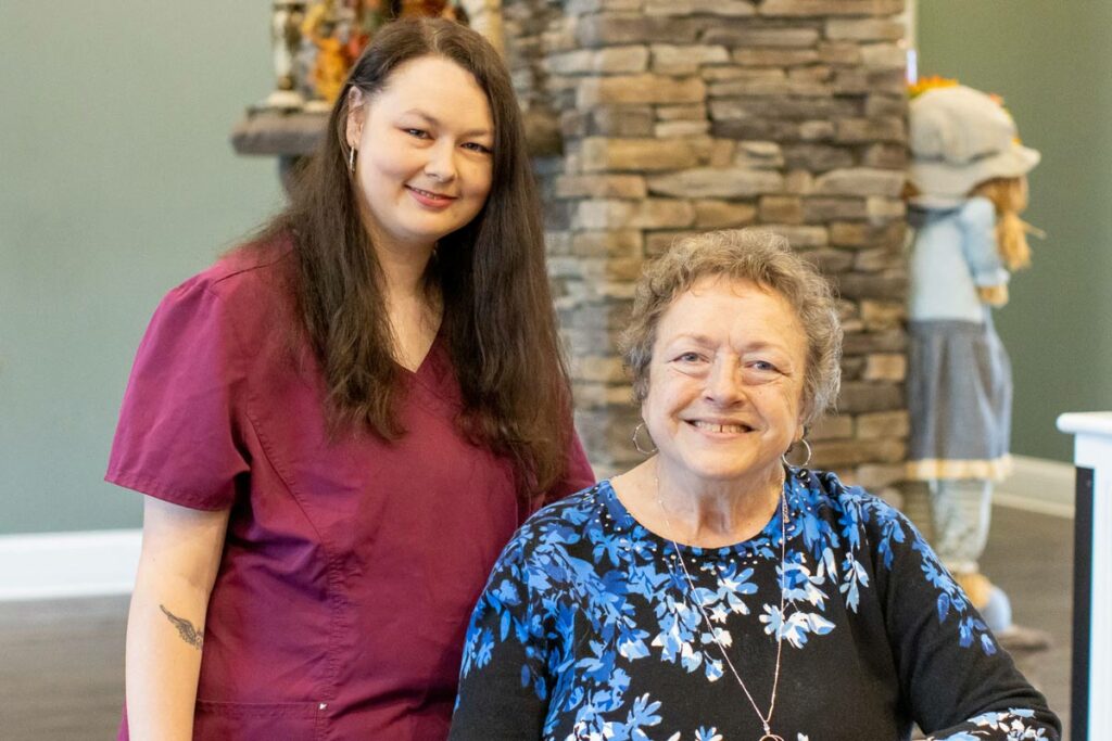 Orchard Ridge Residences associate and resident smiling