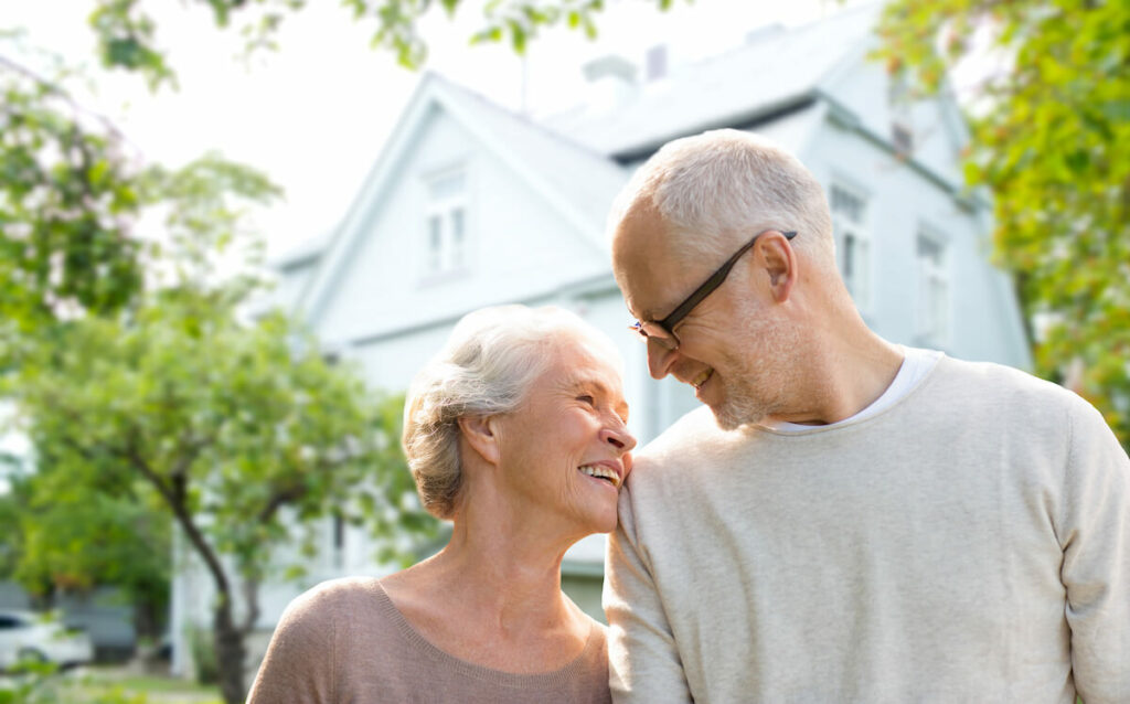 Orchard Ridge Residences | Senior couple-looking at each other outside