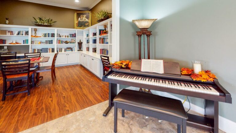 Orchard Ridge Residences library with piano